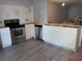 Installing Cabinets and Floor